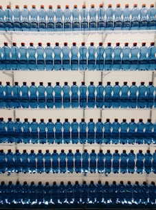 assorted bottled waters on shelf