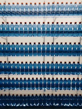 assorted bottled waters on shelf