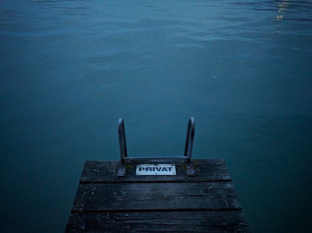 low-light photo of Privat wood dock