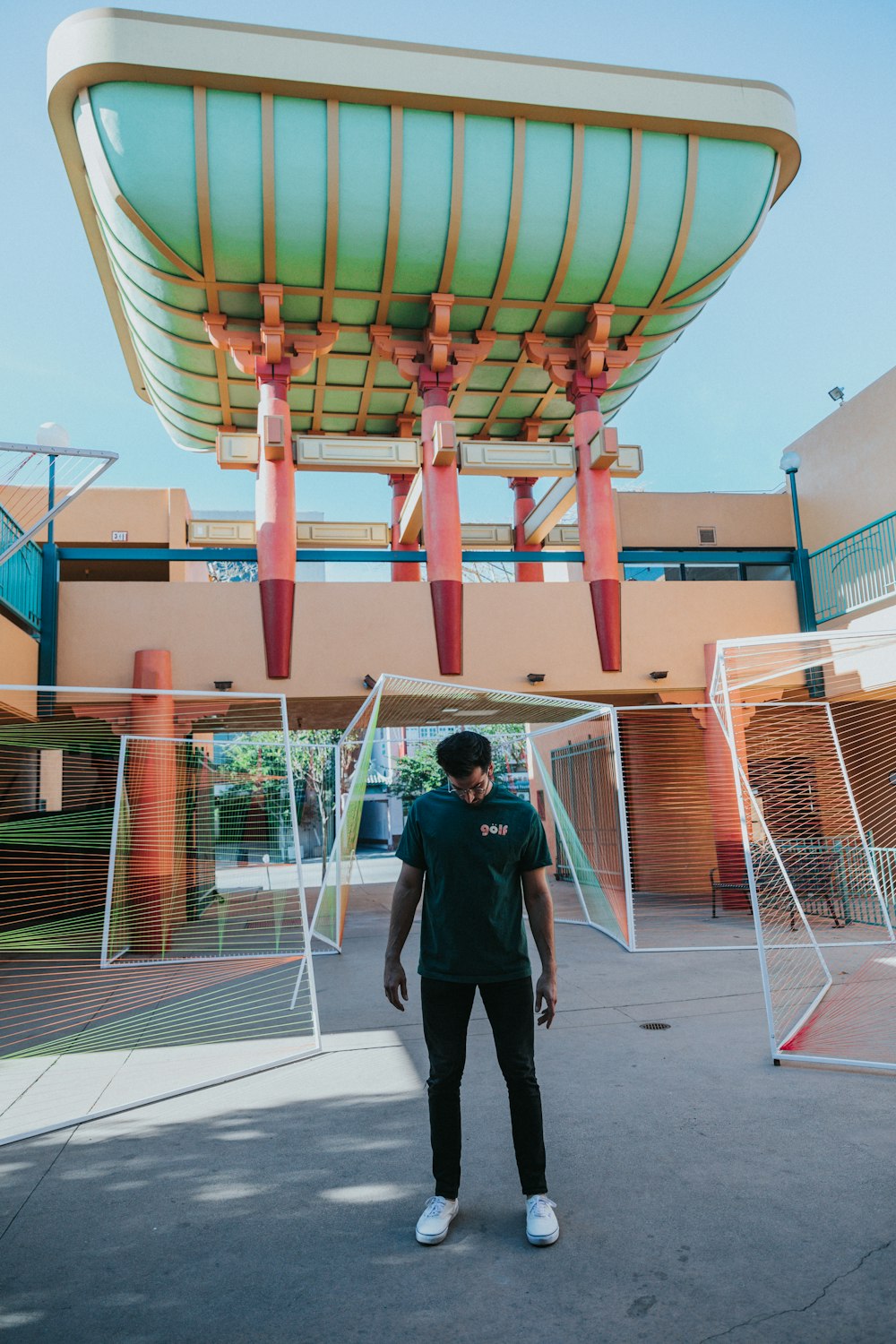 man standing near building