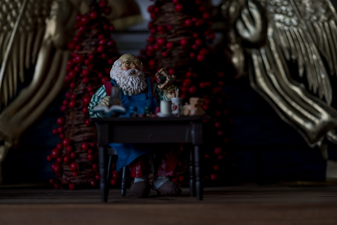grandfather sitting beside table figurine