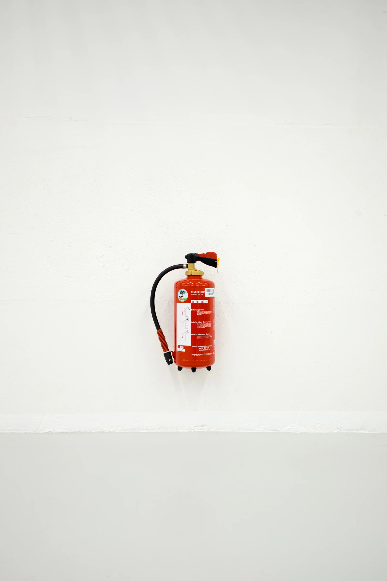 Fire extinguisher mounted on a wall