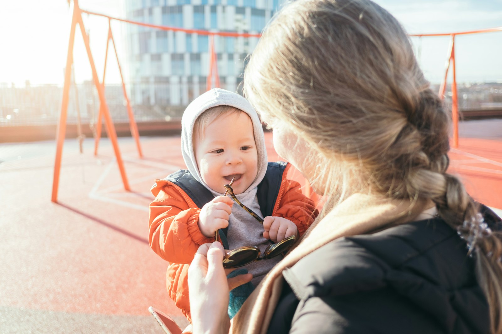 Fujifilm X-T1 + Fujifilm XF 18mm F2 R sample photo. Woman holding toddler on photography