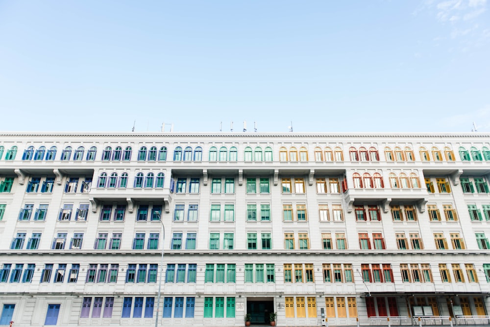 white and multicolored window building at daytime