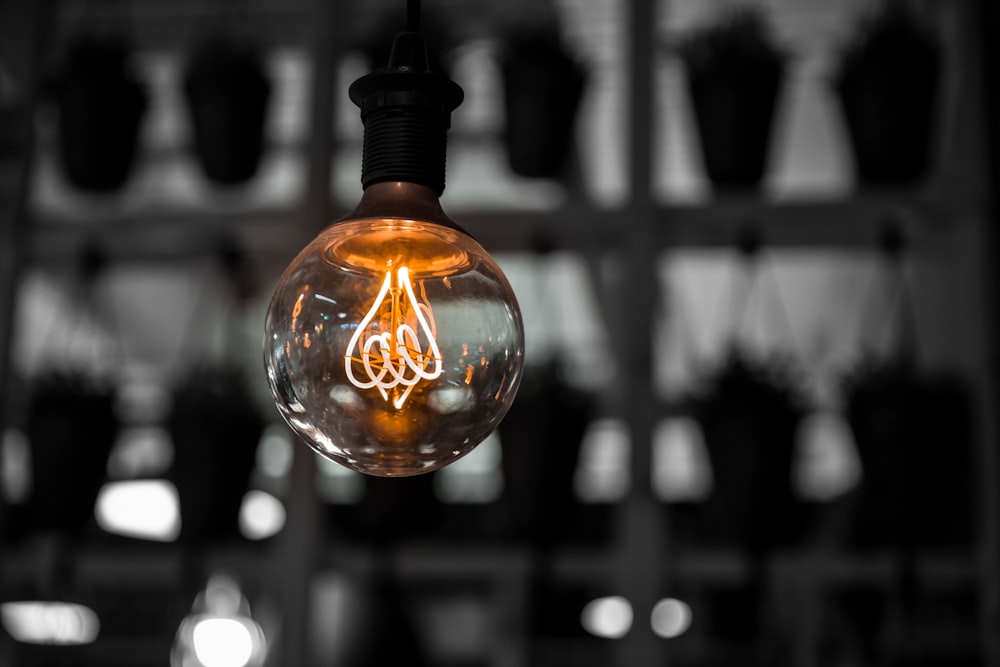 macro photography of clear light bulb