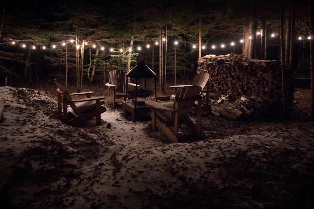 brown wooden adirondack chair on night time