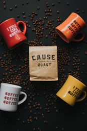four assorted-color cups