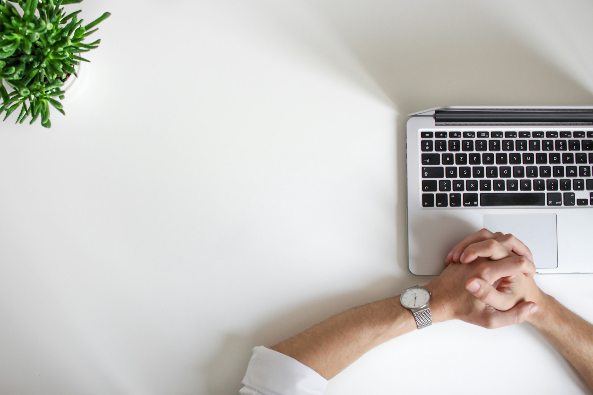 man sitting with laptop