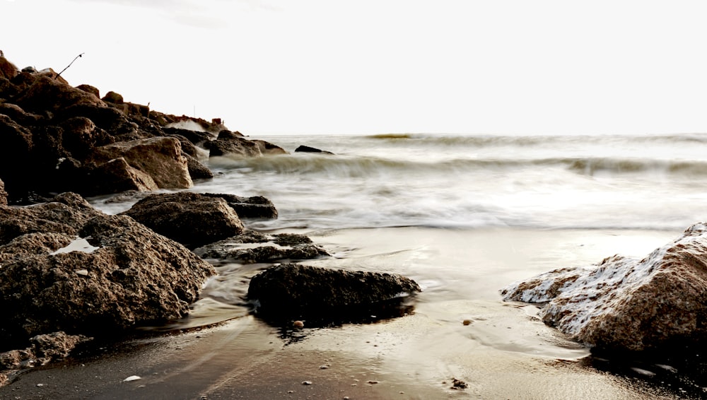 view of rock formation on seashore during daytime