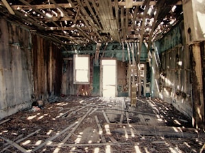 photo of wood planks inside brown wooden shelter