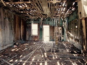 photo of wood planks inside brown wooden shelter