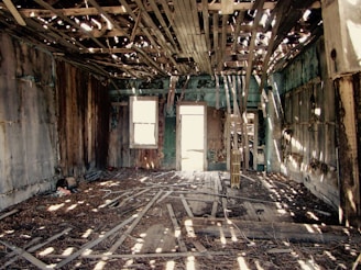 photo of wood planks inside brown wooden shelter