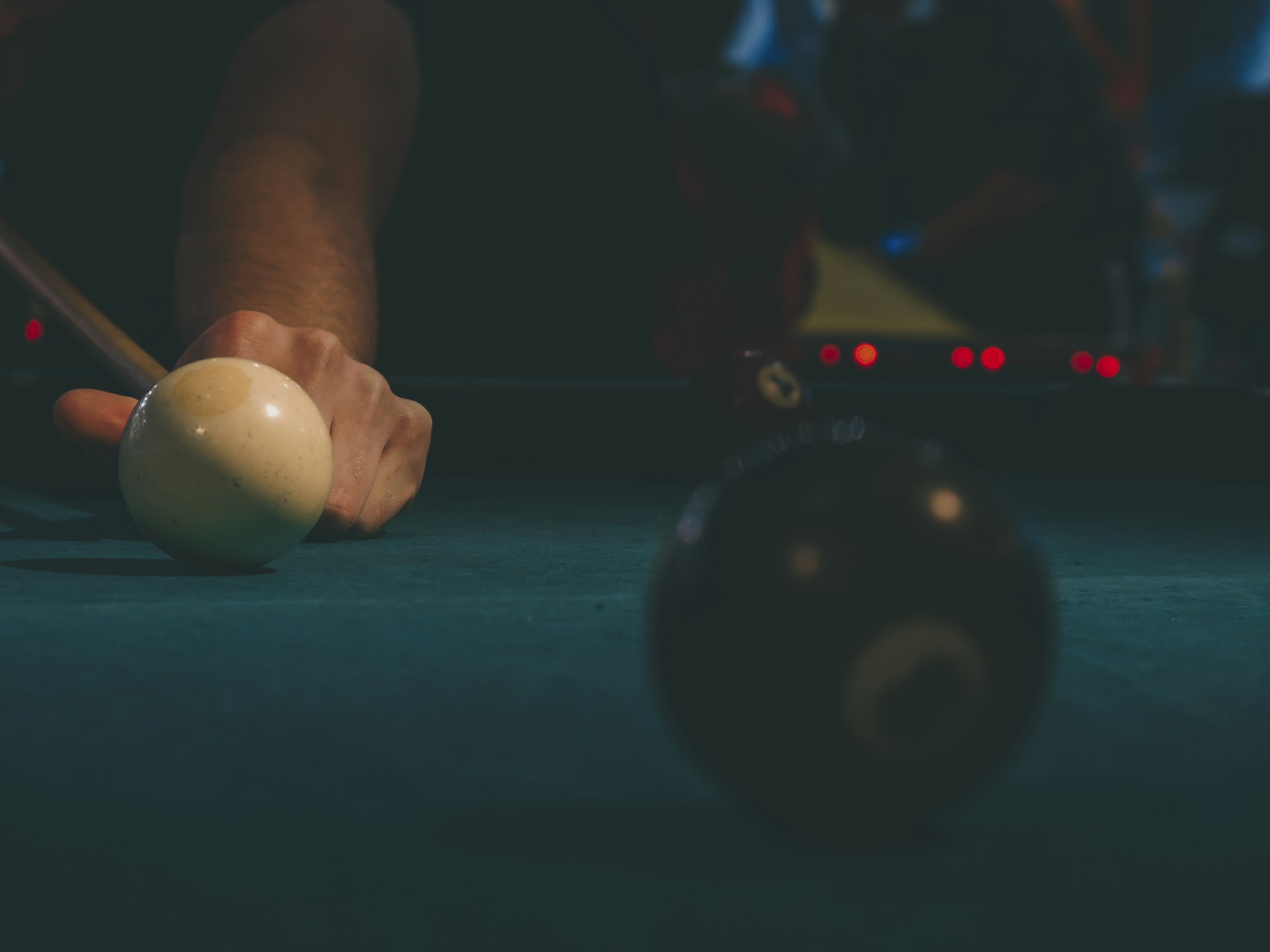 person playing billiards