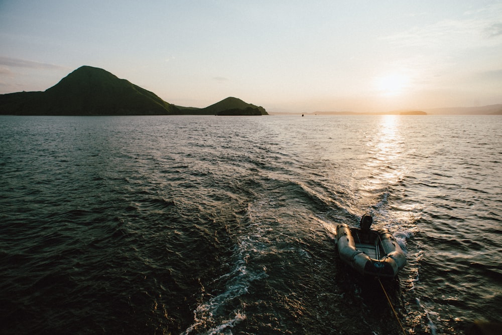 white inflatable jon boat during daytime