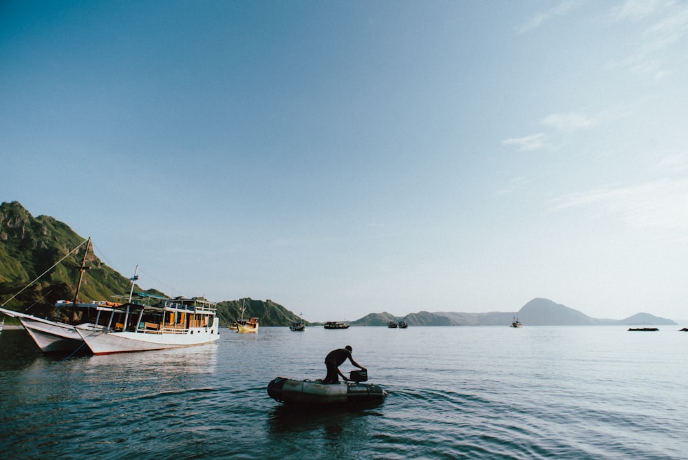 person boating on body of water during daytime