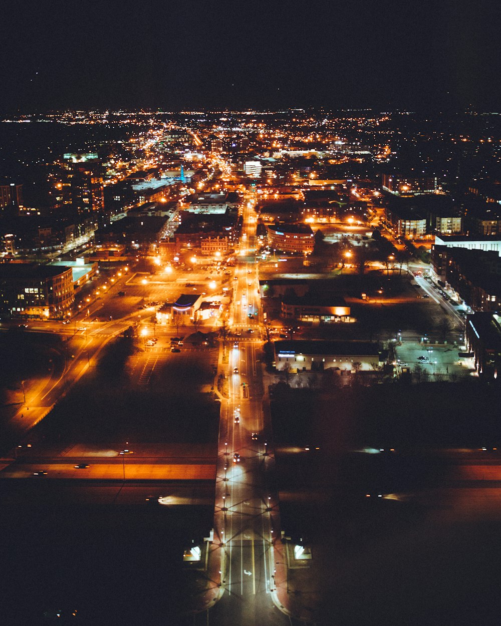 aerial view of road and buildings during nighttime