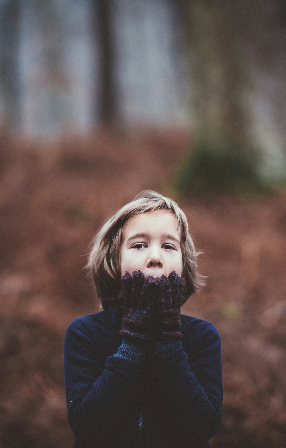 child holding chin