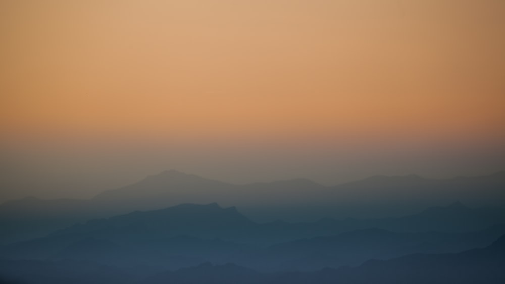 aerial photography of fog mountain