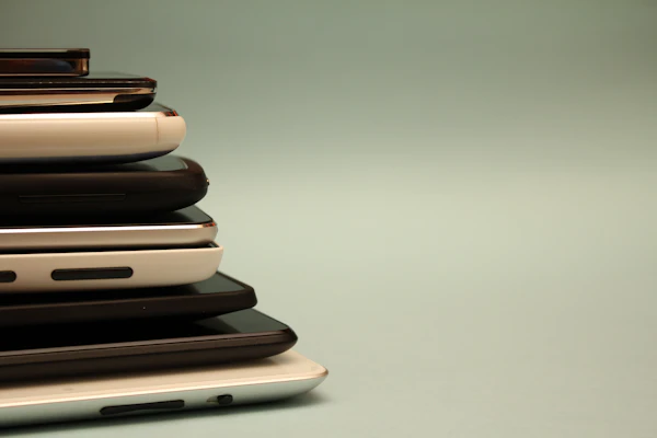 Pile of smartphones and devices ready for bulk supply