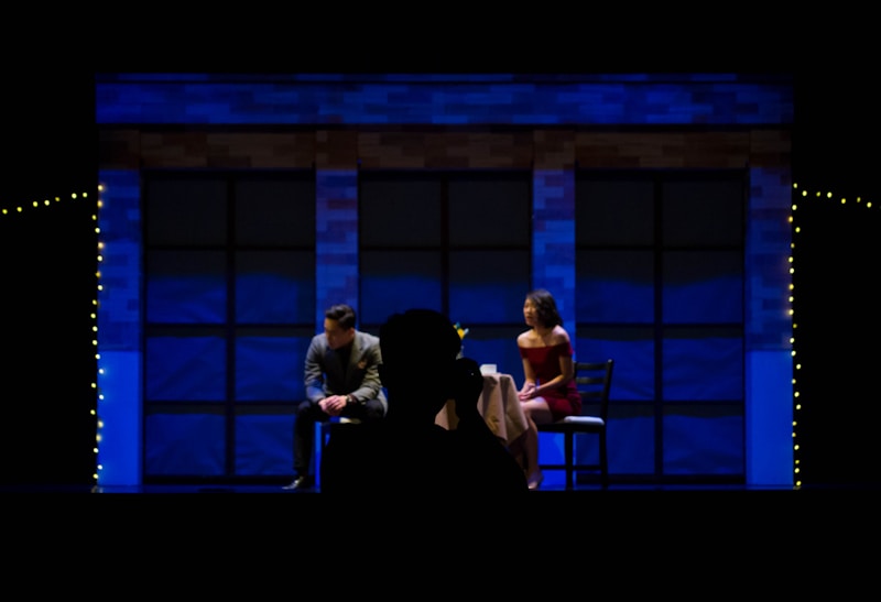 Man and woman sitting on chair together