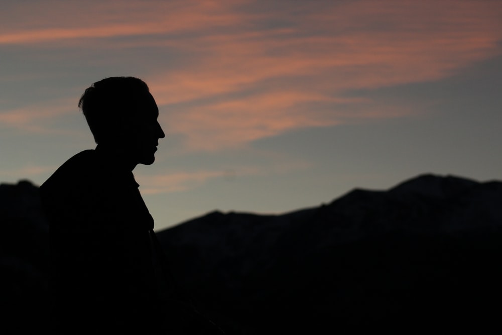 silhouette of man during twilight