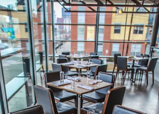 square brown wooden table and chairs