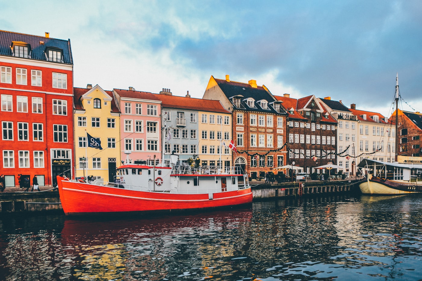Colorful historic buildings lining the Nyhavn canal in Copenhagen