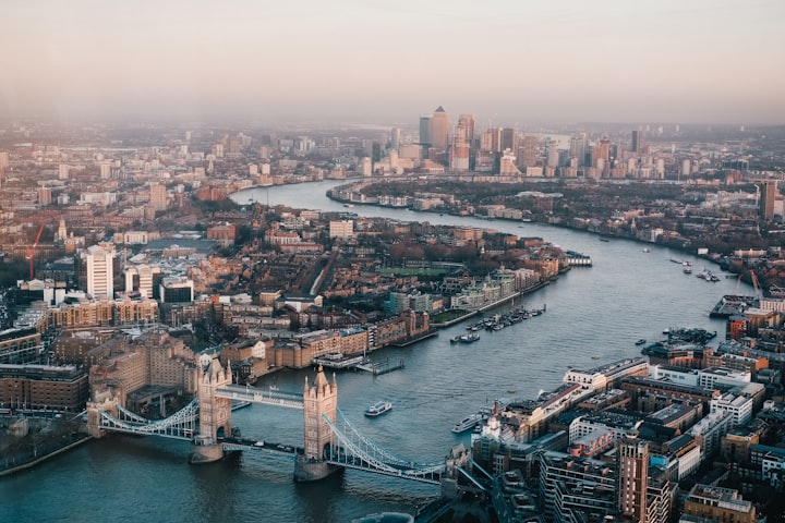 Aerial shot of London showing Tower Bridge and the River Thames