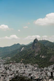 The Rio de Janeiro cityscape seen from the office window, symbolizing our local roots.
