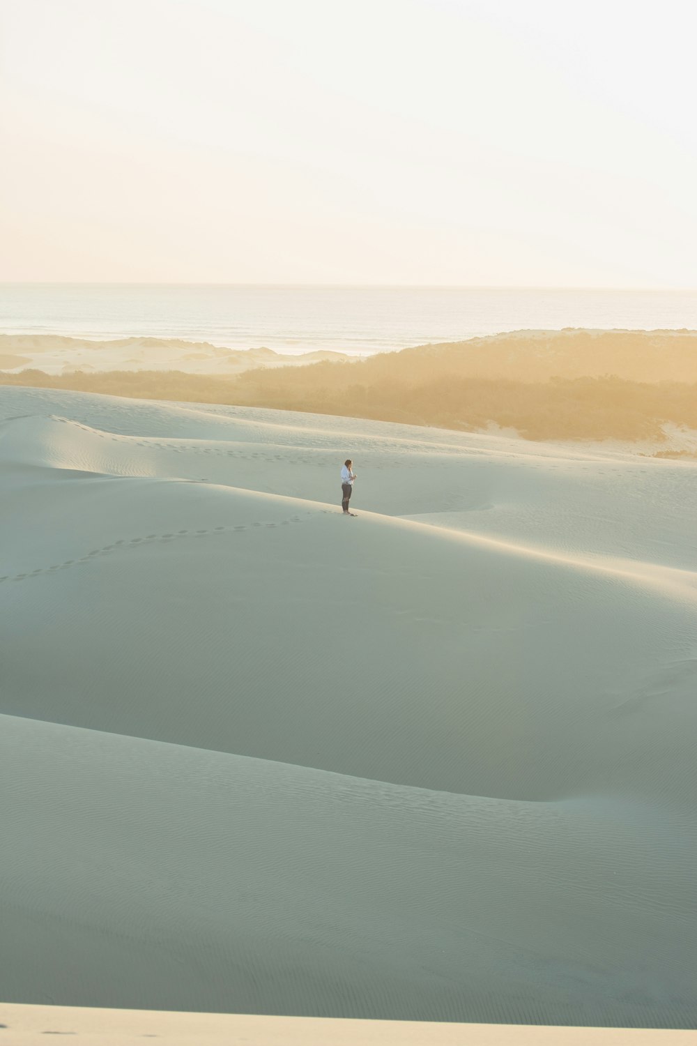 person standing on sand