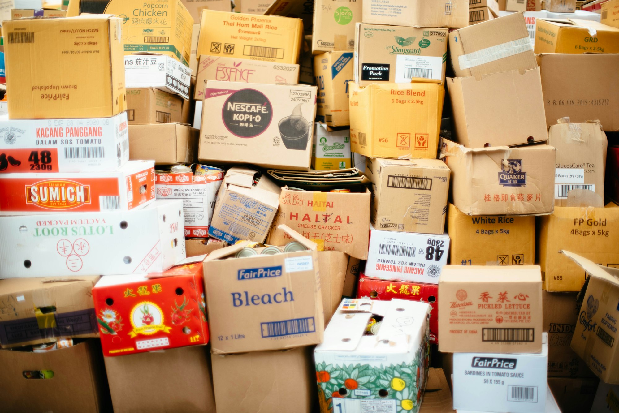 A cluttered mess of boxes at a grocery store