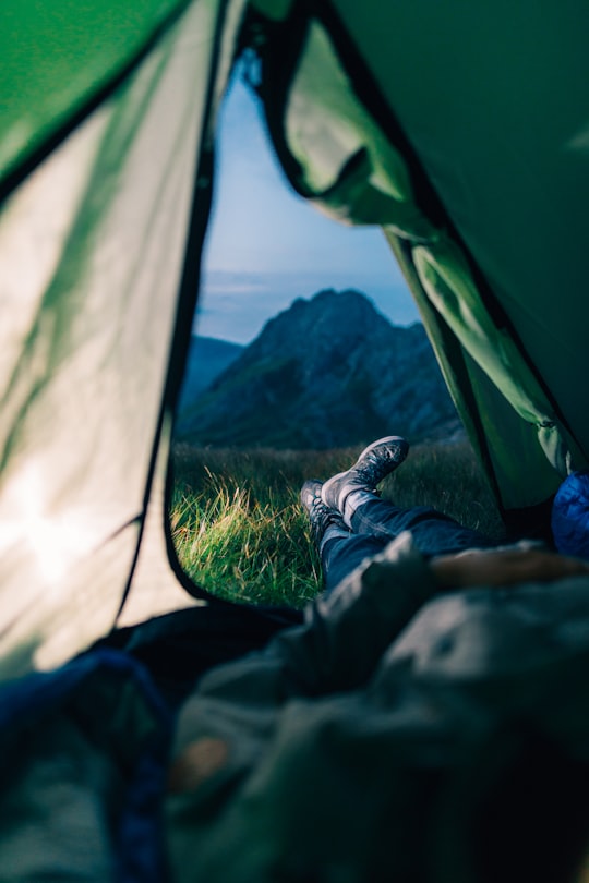 person lying in text in Glyder Fawr United Kingdom