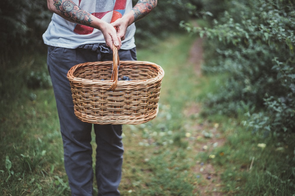 person holding basket