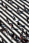peoples walking on pedestrian lane