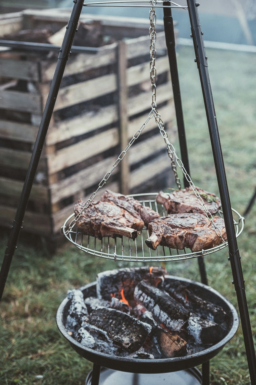 grilling meat during daytime