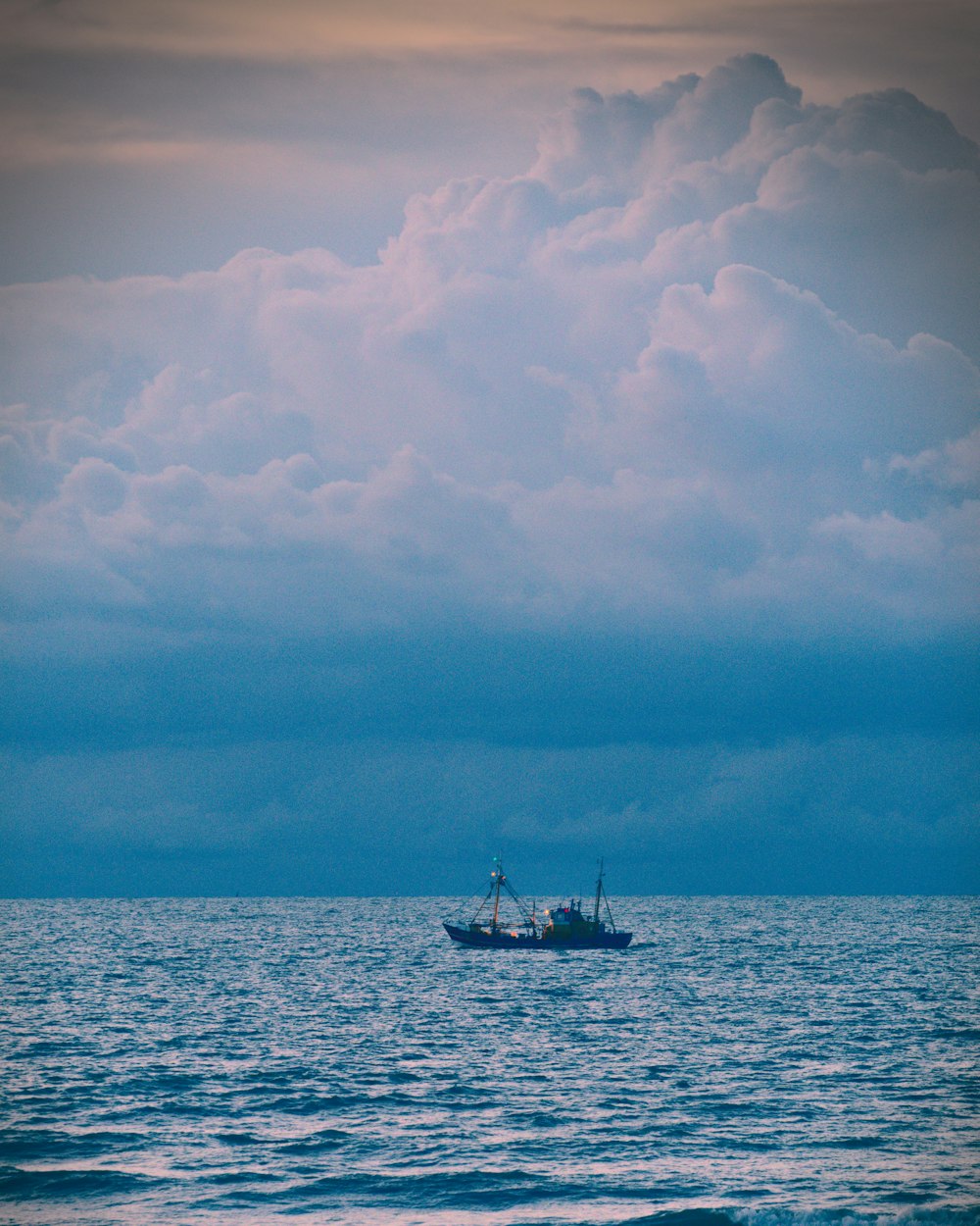 cargo ship in body of water