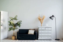 dresser beside sofa