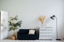 dresser beside sofa