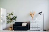 dresser beside sofa