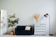 dresser beside sofa