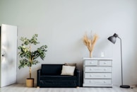 dresser beside sofa