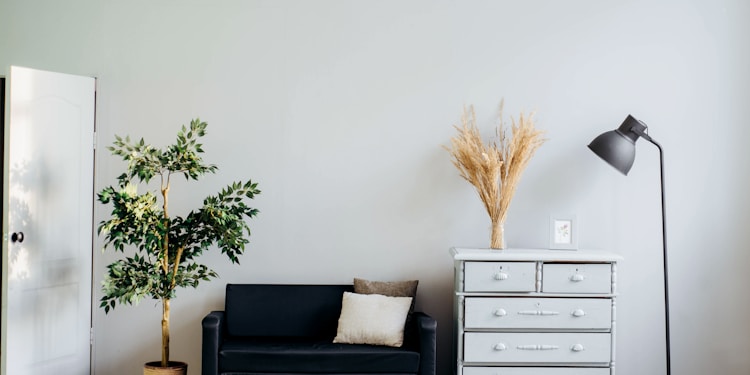 dresser beside sofa