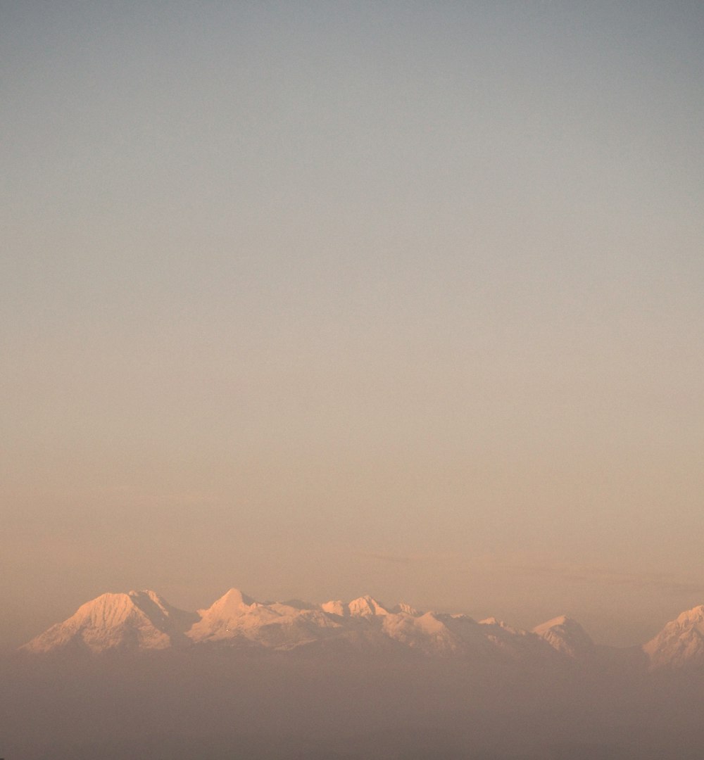 mountain alps under nimbus clouds