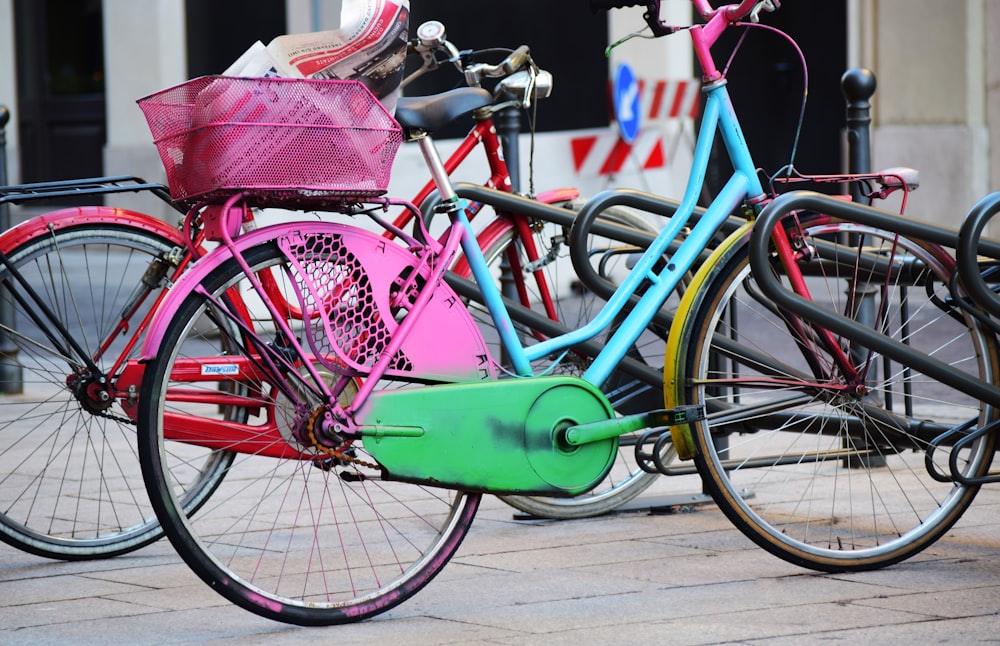 two blue and pink bicycles during daytime