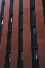 Commercial building facade featuring clean, precise wirecut brickwork with sharp edges.