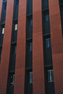 Close-up of a modern home facade built with uniform wirecut bricks.