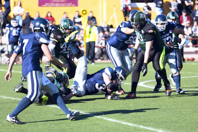 Action shot of a quarterback throwing a pass during the Panamerican Bowl at Emilio Roto Stadium