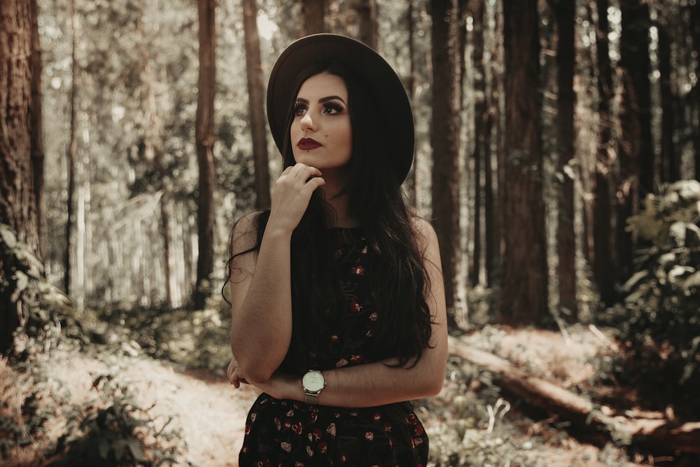 woman surrounded by trees