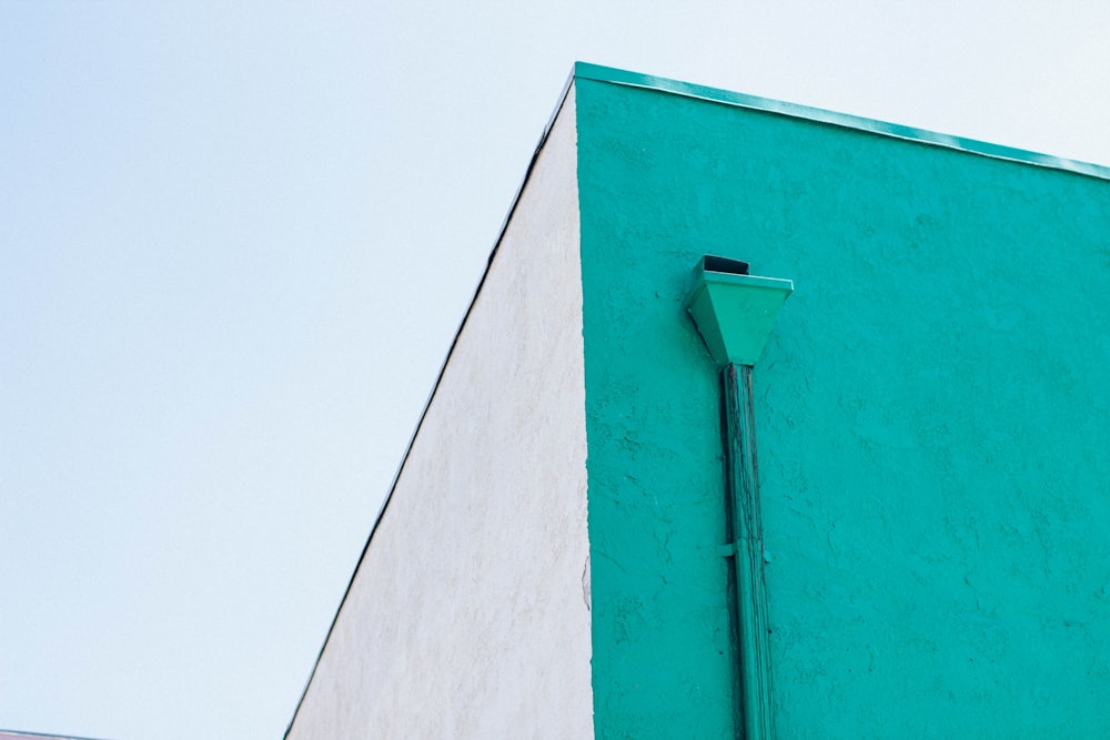 green and white building