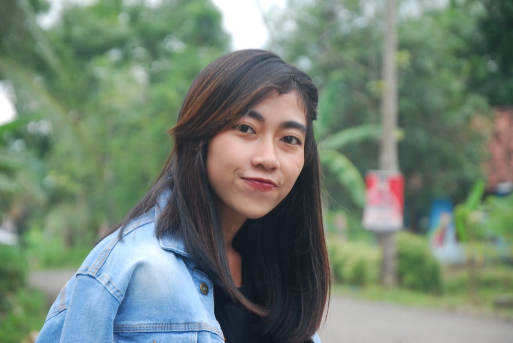 woman wearing chambray jacket